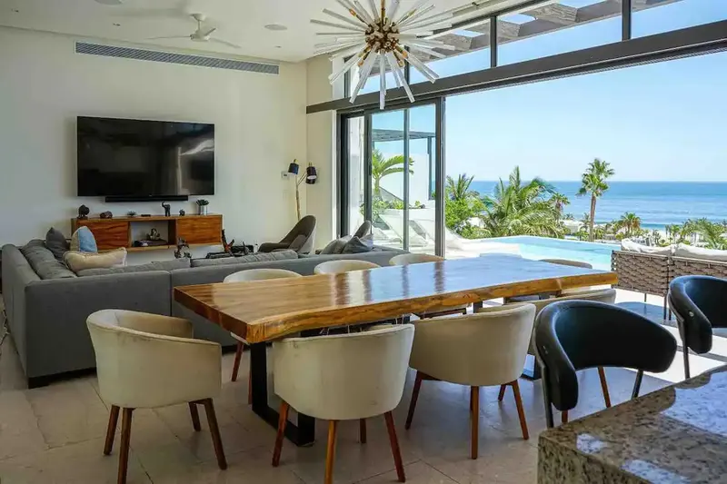 Casa Texas living room looking out to the terrace and ocean